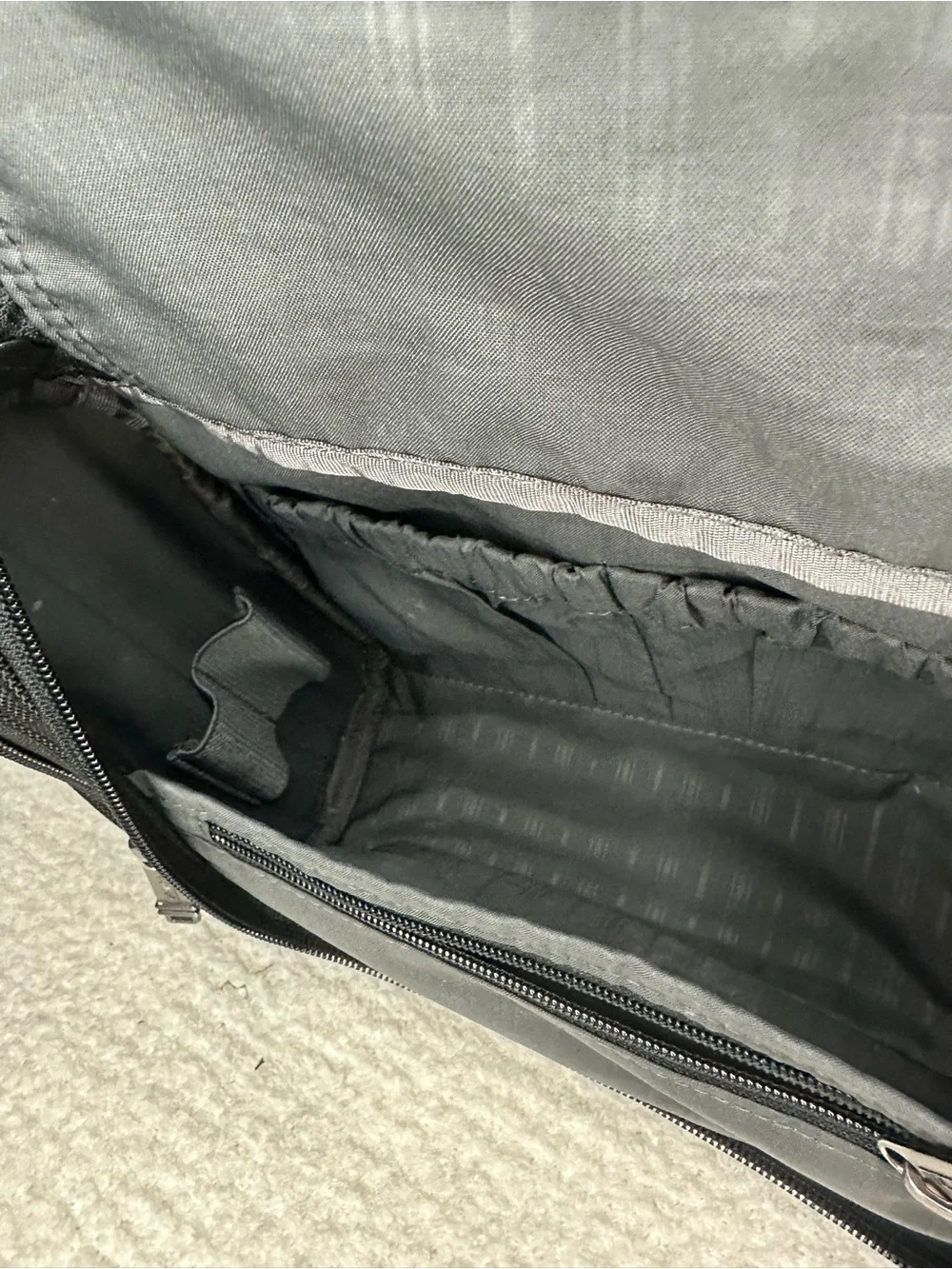 Tumi Black Toiletry Bag with Red Accents